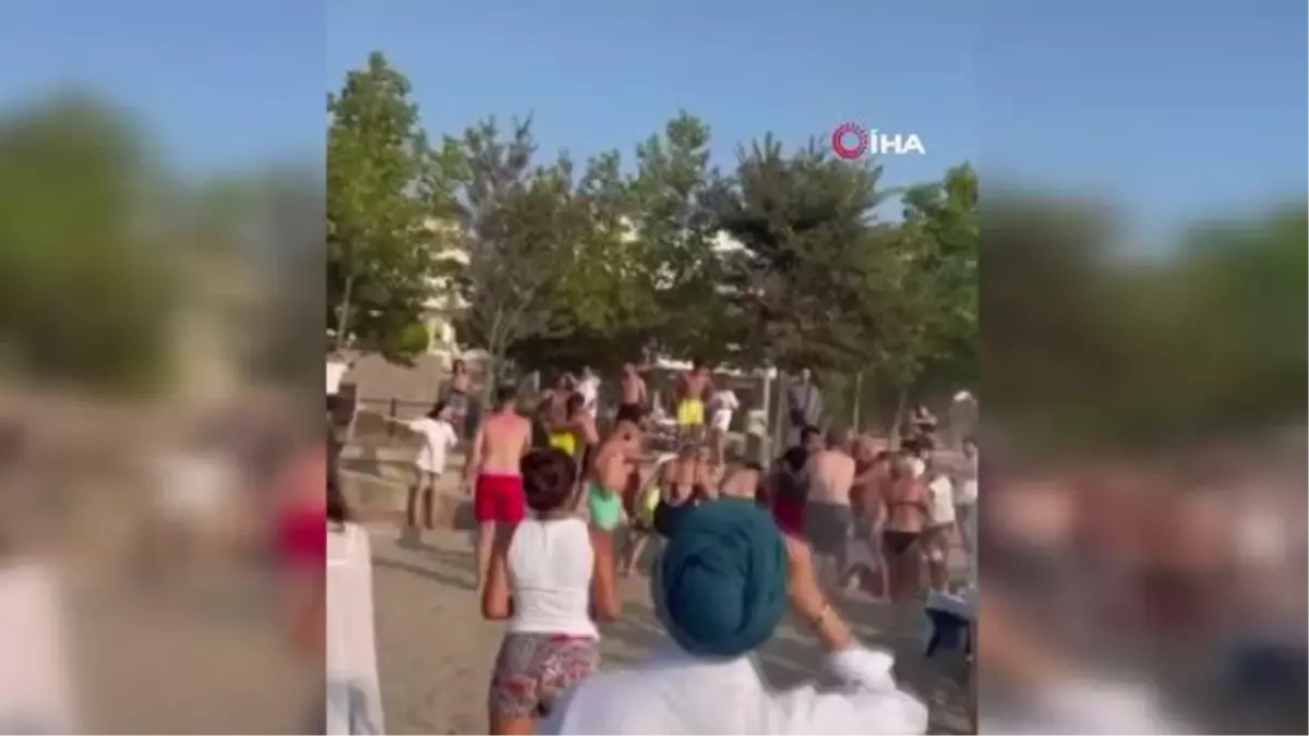 Son dakika haberi... Sahilde yumrukların uçuştuğu kavga kamerada