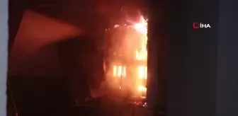 Dumandan etkilenen bebek ve annesine itfaiye eri kendi maskesiyle oksijen verdi