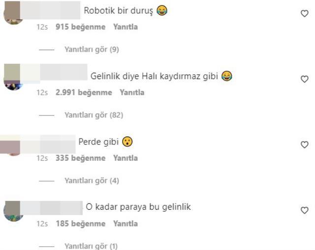 Oğuzhan Koç ile nikah masasına oturan Demet Özdemir'in gelinliği alay konusu oldu Oğuzhan Koç ile nikah masasına oturan Demet Özdemir'in gelinliği alay konusu oldu