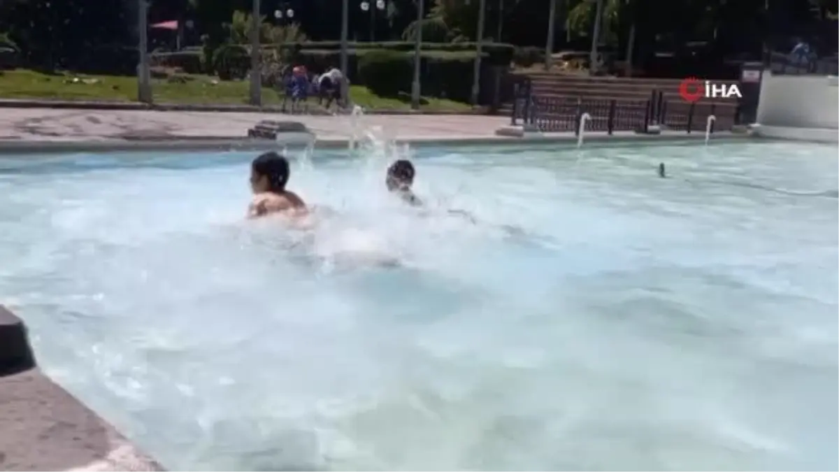 Güneşi gören çocuklar soluğu yine süs havuzlarında aldı