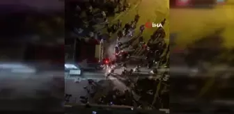 Evdeki hurdaları yakan kadın müdahale edenlerle kavga etti