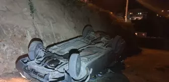 İnşaat alanına devrilen otomobilin sürücüsü yaralandı