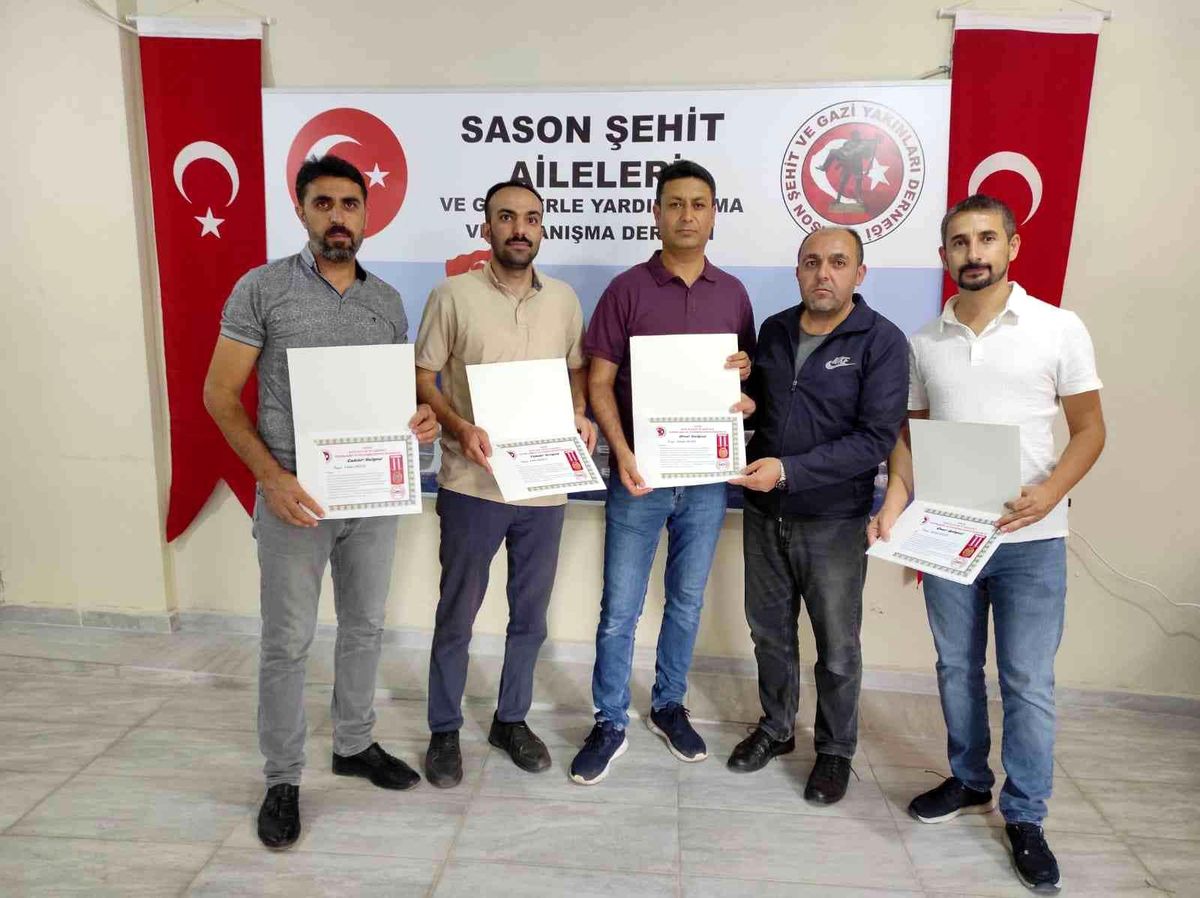 Son dakika yerel: Şehit yakınları, liyakatlı kurum çalışanlarına onur belgesi verdi