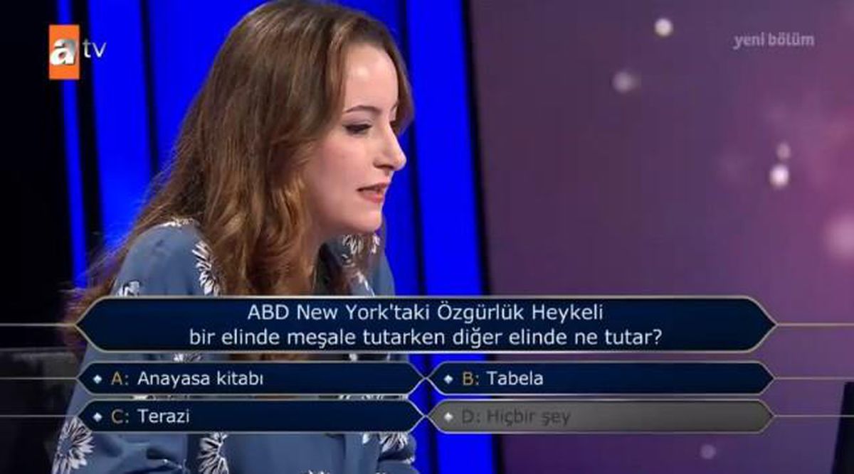 (ABD New York'taki Özgürlük Heykeli bir elinde...) Kim Milyoner Olmak İster 23 Ekim Soru Cevabı Nedir? Kim Milyoner Olmak İster 50 Bin TL'lik soru!