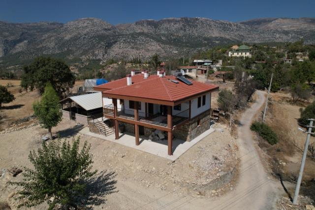 Antalya'da yangından etkilenen vatandaşların evleri için kura çekiliyor