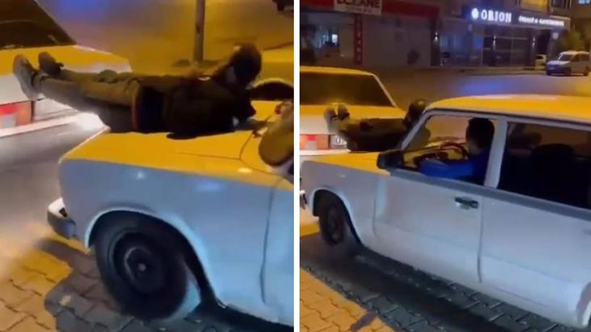 İki otomobilin arasına uzanıp arızalanan aracı ayaklarıyla itti