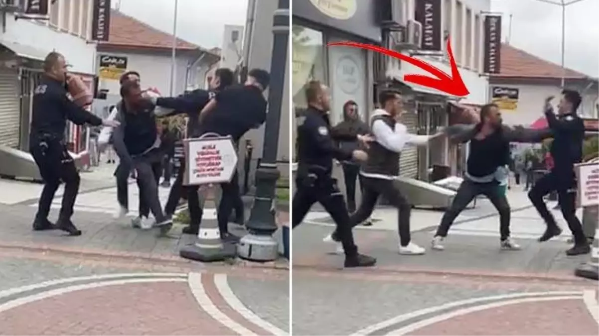 Polise yumruk atan şahsı linçten yine polis kurtardı! O anlar kamerada