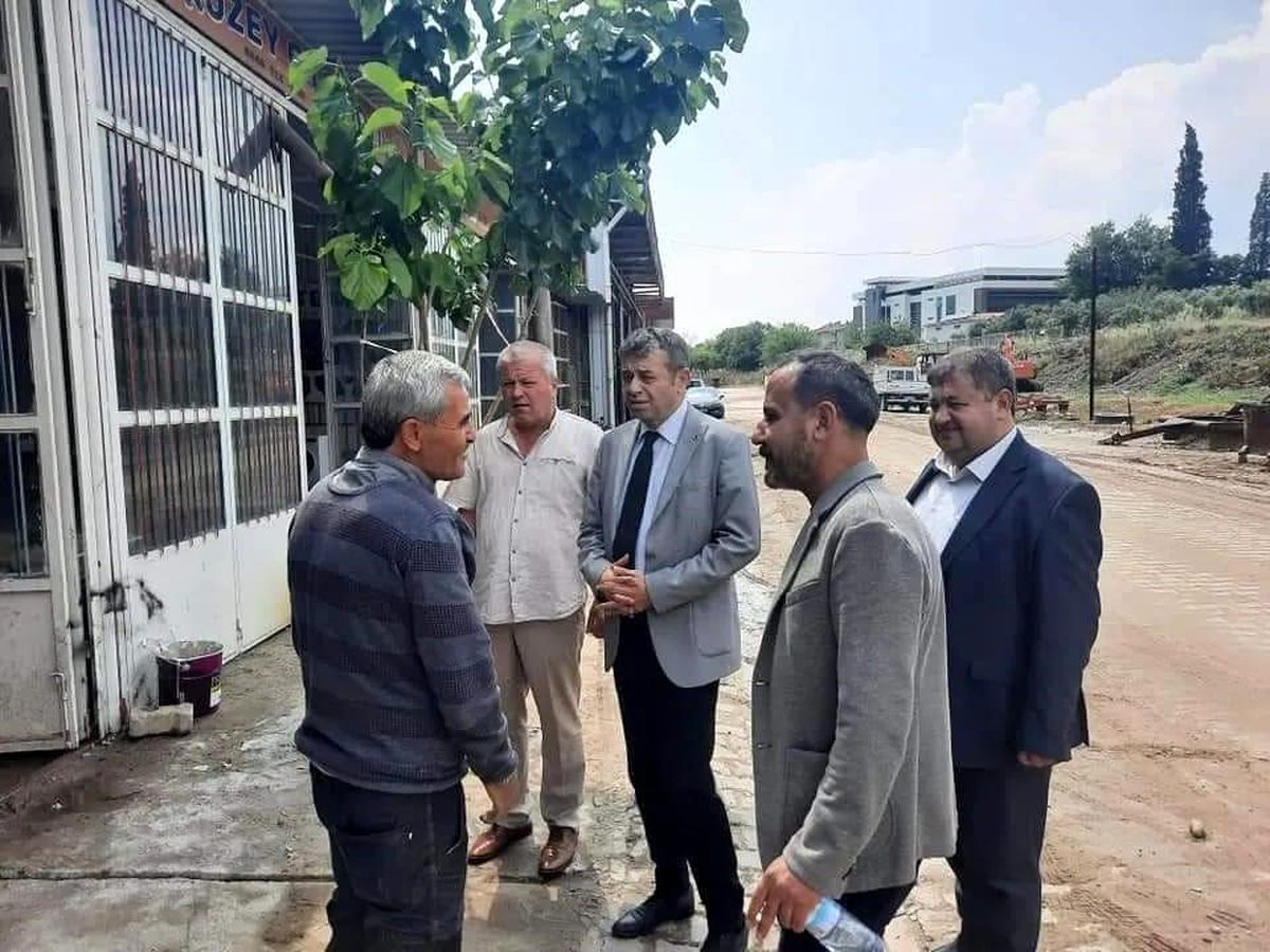 AYESOB Başkanı Künkcü, Kuyucak'ta sel felaketinden etkilenen esnafları ziyaret etti