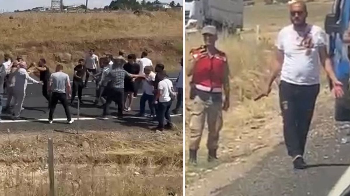 Karayolunda intihara kalkışan adamı tekme tokat dövdüler