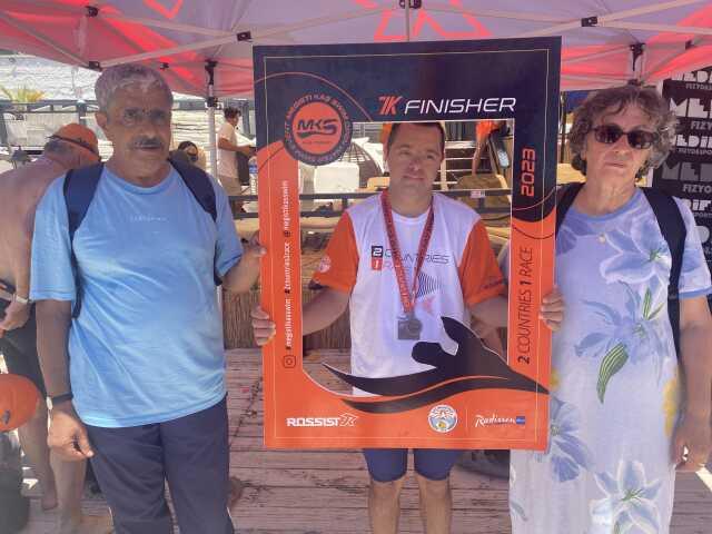 Down sendromlu sporcu Gökhan Kotan'dan dünyada bir ilk! 7 kilometreyi yüzerek geçti Down sendromlu sporcu Gökhan Kotan'dan dünyada bir ilk! 7 kilometreyi yüzerek geçti