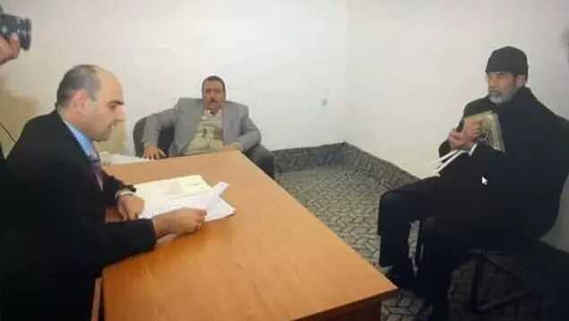 Saddam Hüseyin'in idam öncesi son anlarına ait fotoğraf ortaya çıktı Saddam Hüseyin'in idam öncesi son anlarına ait fotoğraf ortaya çıktı