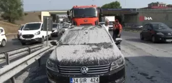 Hafriyat kamyonu ani fren yaptı, taşıdığı beton harcı arkasından gelen otomobilin üzerine döküldü