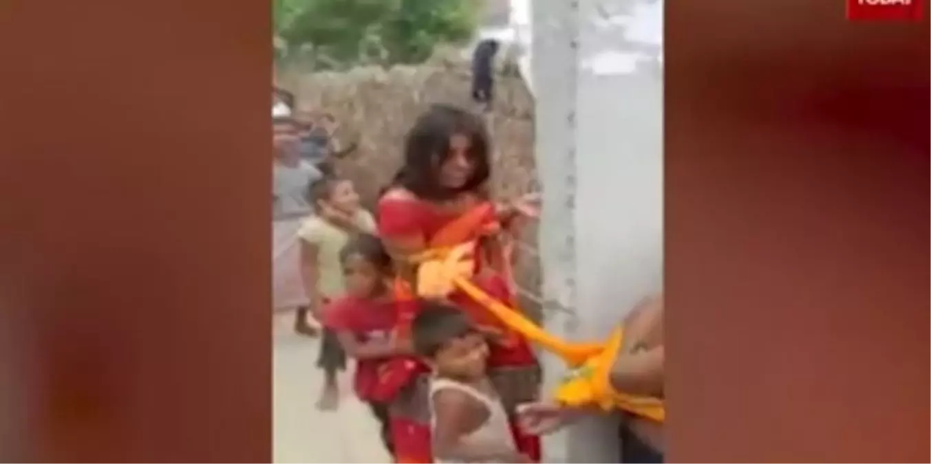 Hindistan'da kayınbiraderi ile uygunsuz şekilde yakalanan kadın köylüler tarafından kayınbiraderi ile direğe bağlanıp dövüldü