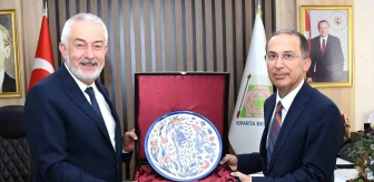 SDÜ Rektörü Mehmet Saltan, Isparta Belediye Başkanı Şükrü Başdeğirmen'i ziyaret etti