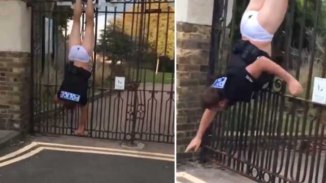 Londra'da polis kapa korkuluğuna sıkıştı: Çevredekiler önce videoya aldı sonra yardım etti