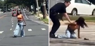 ABD polisi, elinde silahla yol ortasında yürüyen kadını otomobille çarparak etkisiz hale getirdi