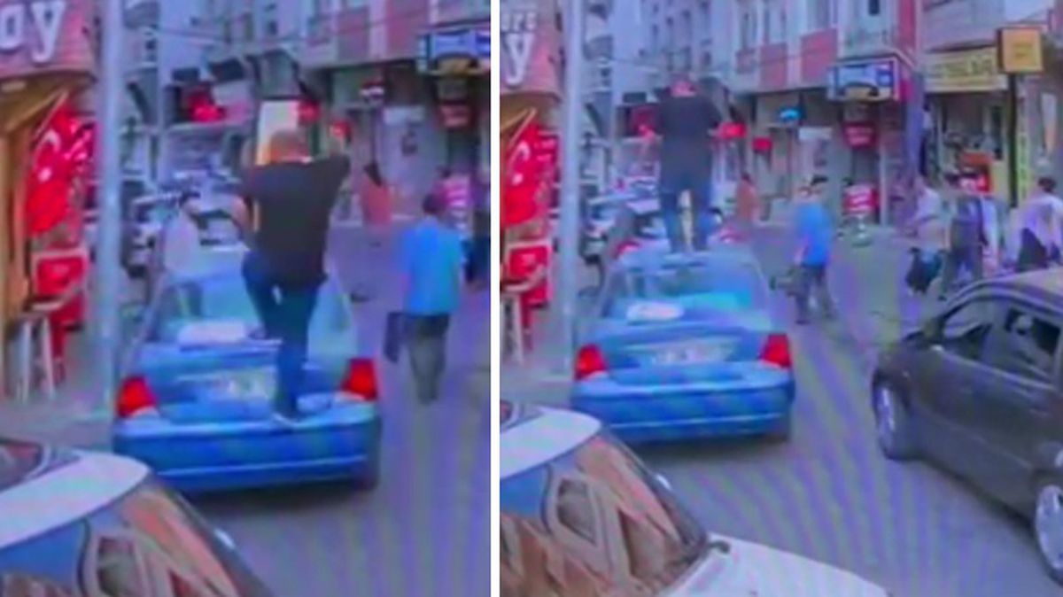 Trafikte tartıştığı adamın otomobilinin üzerine çıkıp tepindi! O anlar kamerada