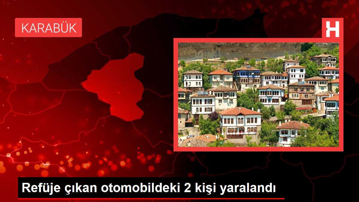 Refüje çıkan otomobildeki 2 kişi yaralandı