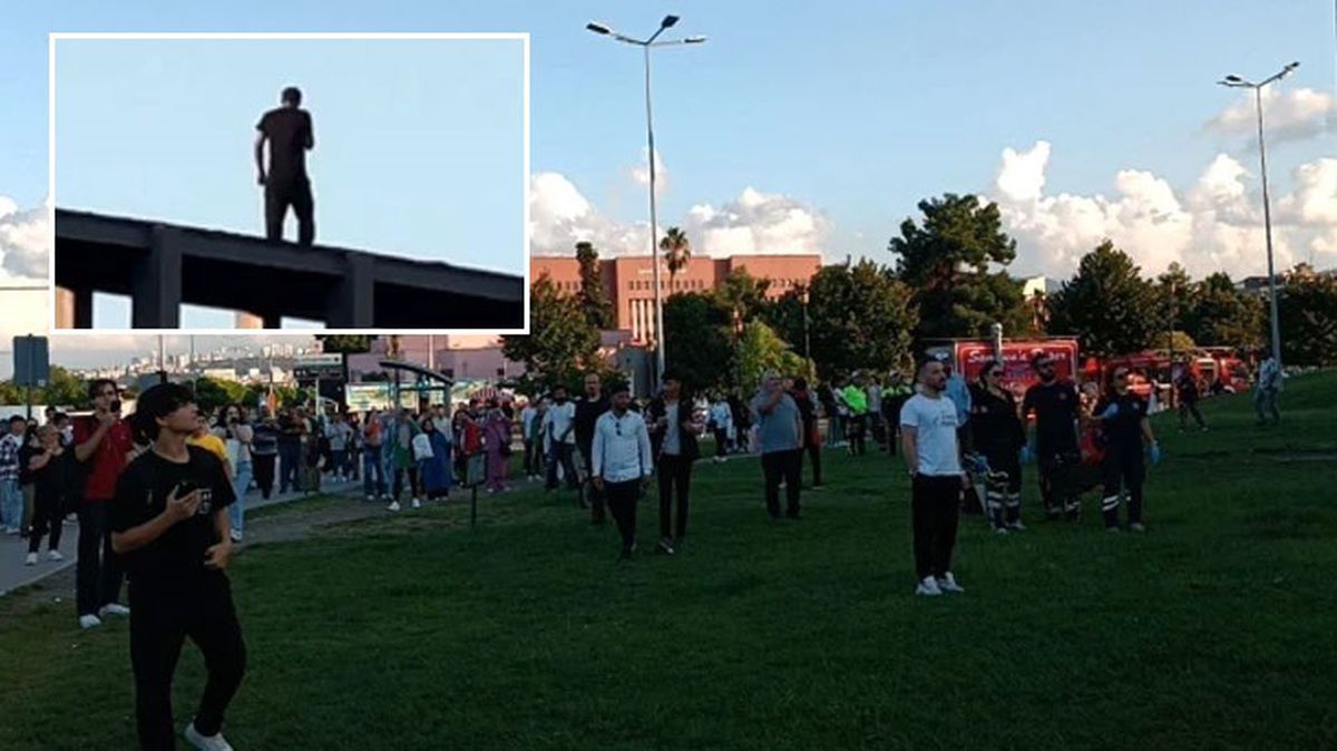 Samsun'da intihar etmek için korkuluklara çıkan genci film izler gibi seyrettiler