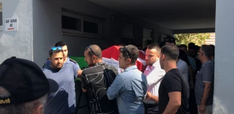 Yamaç paraşütü kazasında hayatını kaybeden pilotun cenazesi Adana'da toprağa verildi