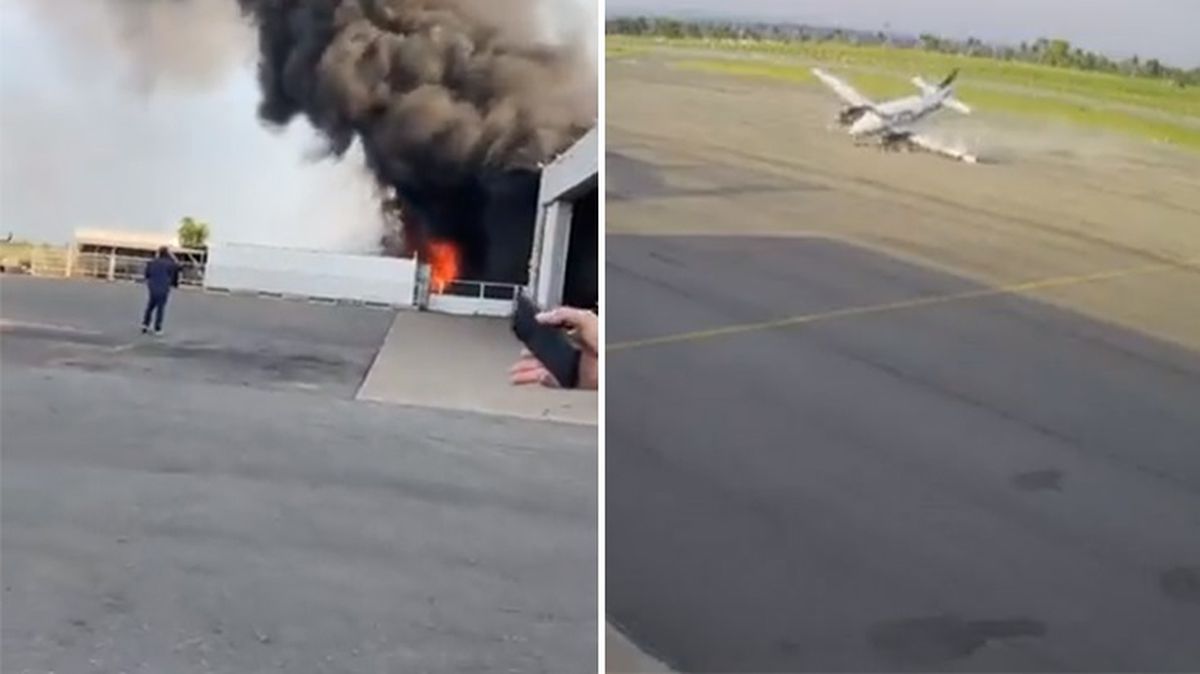 İniş sırasında yan yatan uçak, hangara girip infilak etti