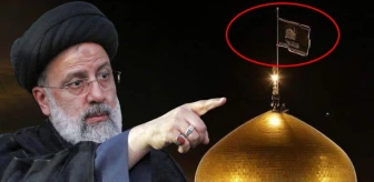 İsrail'in hastane bombardımanı sonrası İran, Razavi Türbesi'ne 'İntikam' çağrısını temsil eden kara sancak çekti
