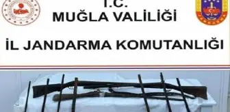 Muğla'da Tarihi Eser Operasyonu: Kur'an-ı Kerim ve Sikke Ele Geçirildi