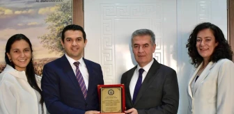 Buharkent Meslek Yüksek Okulu Yöneticileri Belediye Başkanı'na Teşekkür Plaketi Takdim Etti