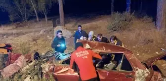 Bucak'ta ehliyetsiz sürücünün otomobili şarampole devrildi, 2 kişi yaralandı
