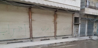Münbiç'teki esnaf, PKK/YPG'nin haraç uygulamasını protesto etmek için kepenk kapattı