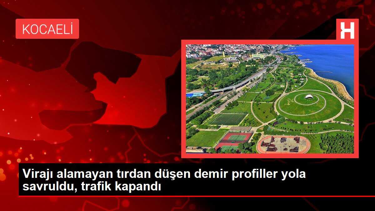 Virajı alamayan tırdan düşen demir profiller yola savruldu, trafik kapandı