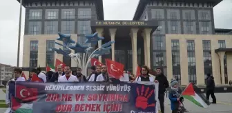 Kütahya'da İsrail'in Gazze'ye yönelik saldırılarına tepki gösteren grup sessiz yürüyüş düzenledi