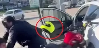 Bursa'da Otomobil Sürücüsü Motosikletliyi Kaskıyla Darbetti