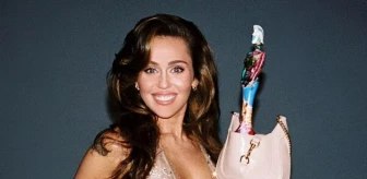 Brti 2024 en iyi şarkı ödülünü alan şarkıcı Miley Cyrus, altına sutyen giymediği tül elbisesi ile baş döndürdü
