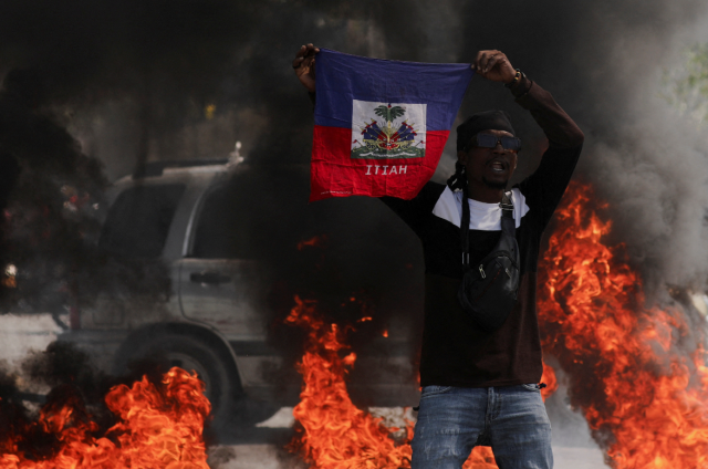 Haiti'de silahlı çeteler hapishaneye saldırdı! 3 bin 600 mahkum firar etti, 12 kişi öldü