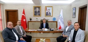 Hak-İş Konfederasyonu Öz Büro İş Sendikası Karadeniz Bölge Başkanı Mahmut Somuncu, TOGÜ Rektörü Prof. Fatih Yılmaz'ı ziyaret etti