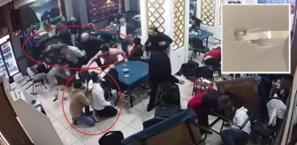 Silahlı çatışmaya tanık olan kahvehanedekilerin paniği kamerada