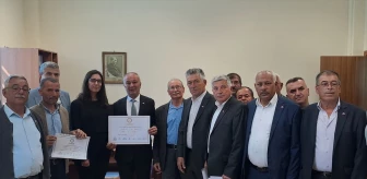 MHP'li Ramazan Ezin'e Çeltikçi Belediye Başkanı olarak mazbata verildi