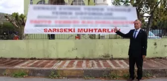 Yeni seçilen muhtardan cenaze yemekleri için afişli uyarı