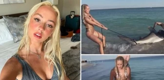 Model Natalie Reynolds, köpek balığının sırtında poz verdiği sırada anüsünden yaralandı
