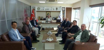 Deniz Ticaret Odası İzmir Şubesi Yönetim Kurulu Başkanı Kuşadası Ticaret Odası'nı Ziyaret Etti