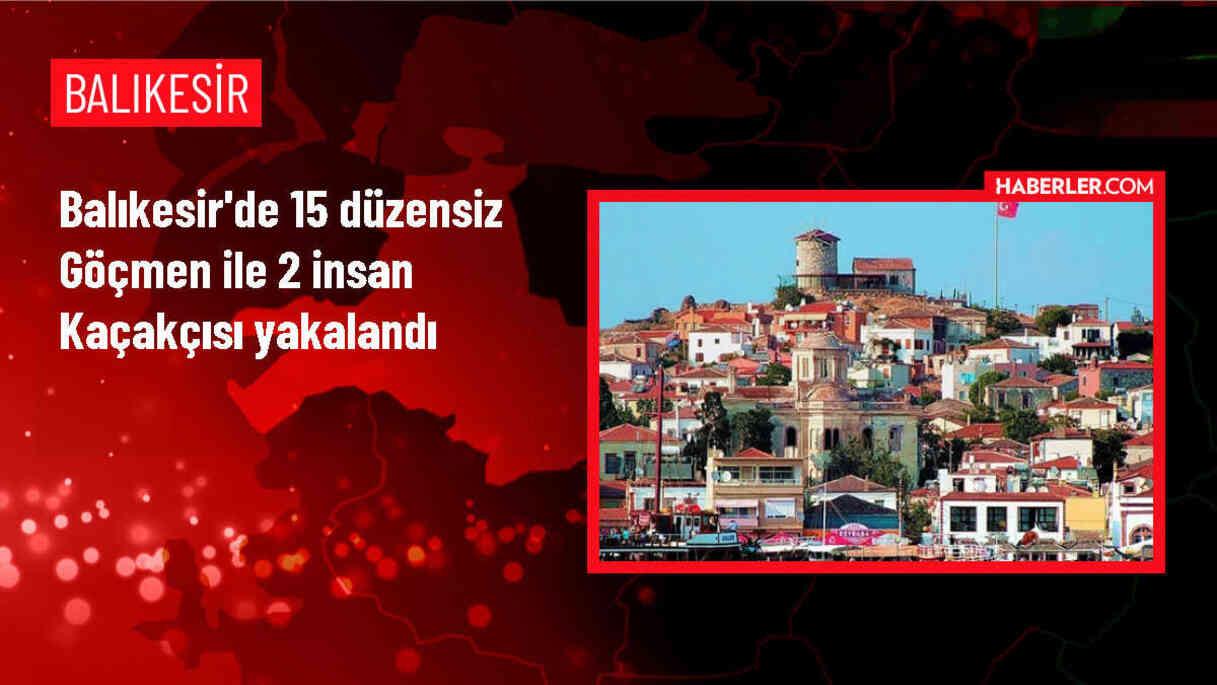 Ayvalık'ta 15 düzensiz göçmen ve 2 insan kaçakçısı yakalandı