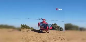 Dağlık alana düşen paraşütçü ambulans helikopterle hastaneye sevk edildi