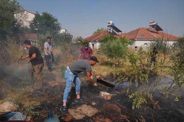 İzmir'de iki ilçede ormanlık alanda çıkan yangın büyüdü! 1 mahalle tahliye edildi