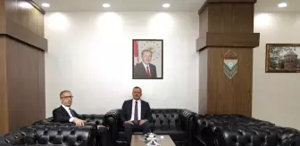 Bitlis İl Genel Meclis Başkanı Ali Akın, Bitlis Eren Üniversitesi Rektörü Prof. Dr. Necmettin Elmastaş'ı ziyaret etti