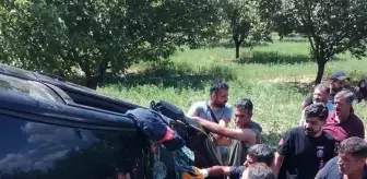 Malatya'da otomobil bahçeye devrildi, sürücü yaralandı