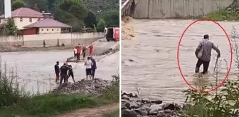 Derenin karşısına geçmek isteyen imamın imdadına belediye ekipleri yetişti