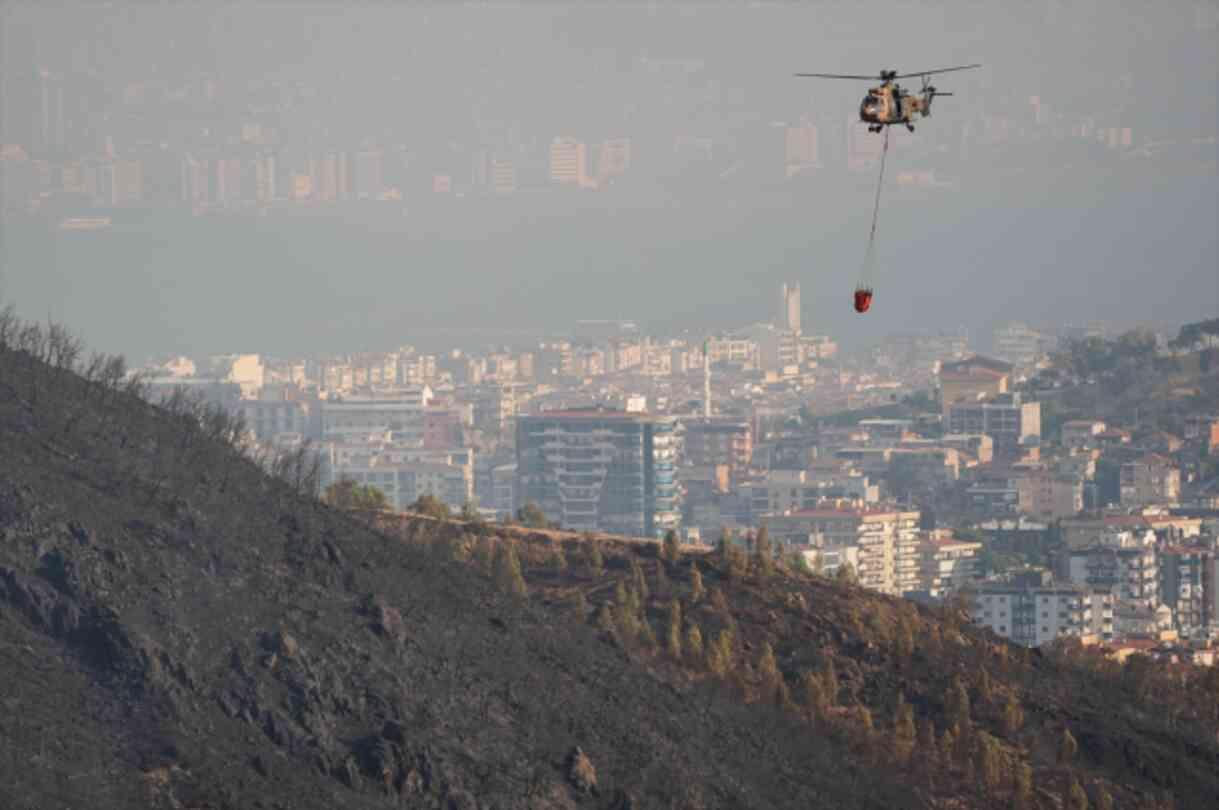 Flames spread to the roofs of buildings in the fire in İzmir