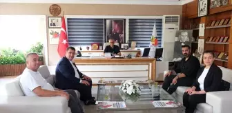 AESOB Başkanı Adlıhan Dere, Kemer Belediye Başkanı Necati Topaloğlu'nu ziyaret etti