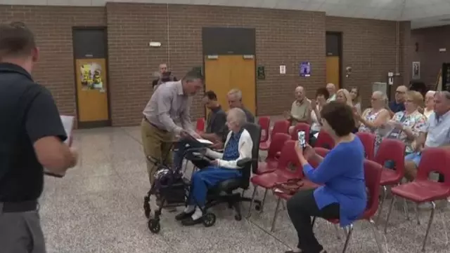 A 99-year-old woman graduated from high school 81 years after she left during World War II.